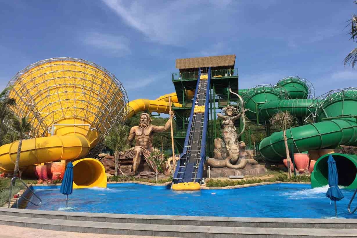 View of giant slides and mythological statues at Aquatopia Water Park on Thom Island in Phu Quoc