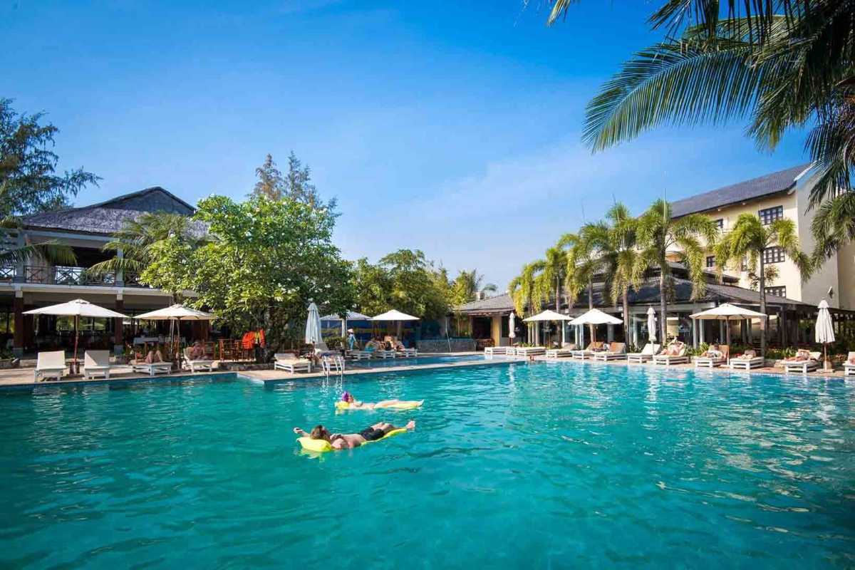 Resort pool view in Phu Quoc for guests joining the sunrise fishing tour with breakfast and lunch